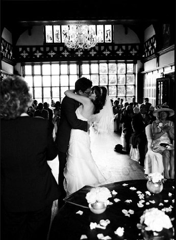 mr and mrs mcnabb sealed with a kiss during their wedding ceremony at the hillbark hotel in the wirral