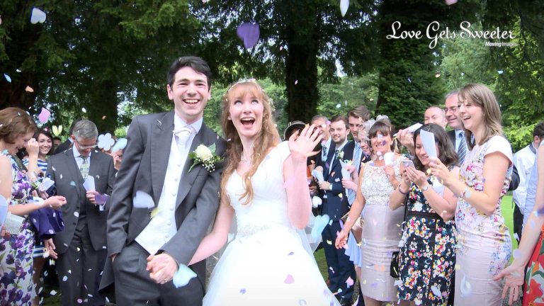 confetti shot outside mitton hall excited bride