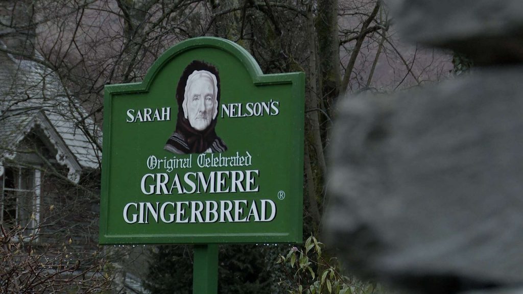 the bright green Grasmere Gingerbread shop with a picture of sarah Nelson on
