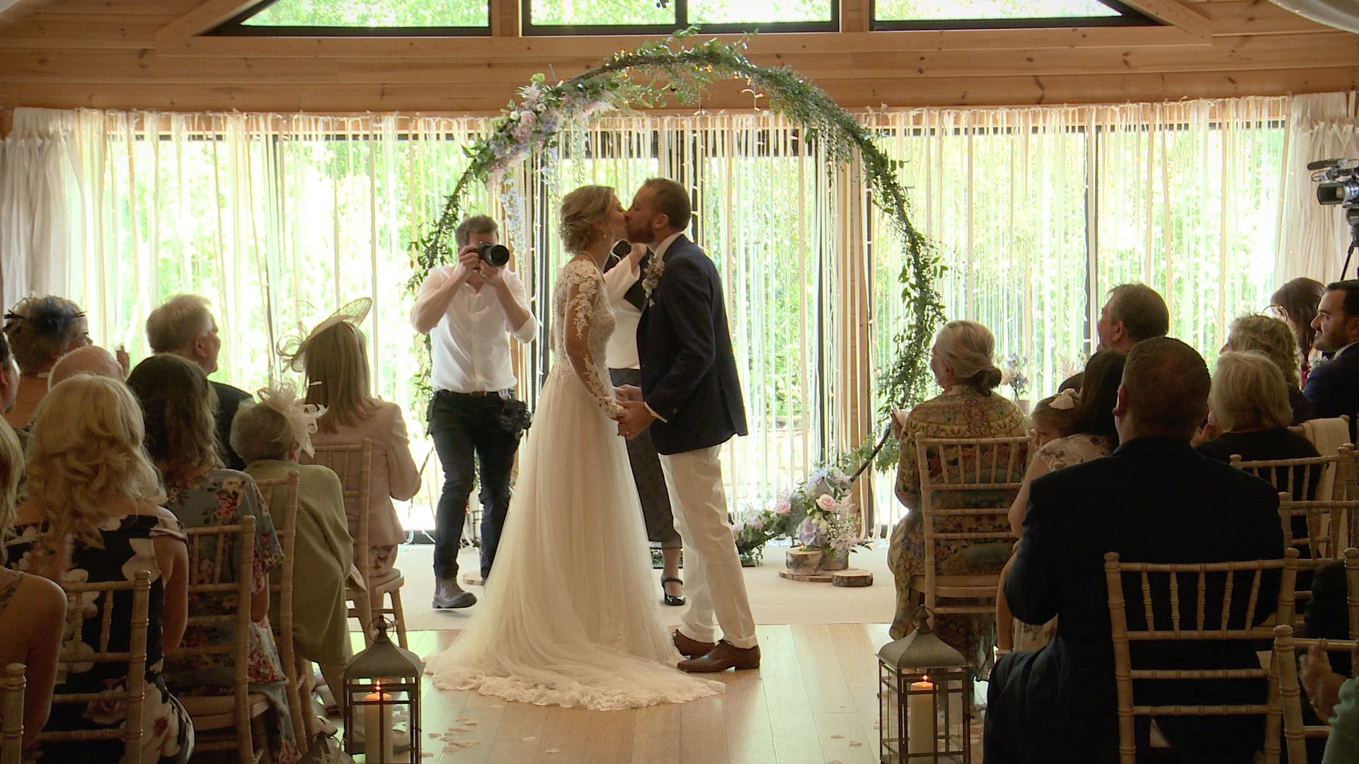 the kiss from the bottom of the aisle at Styal Lodge in Cheshire