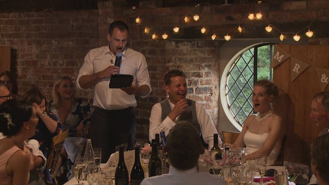 a video still of a best man wedding speech at Dunham Massey