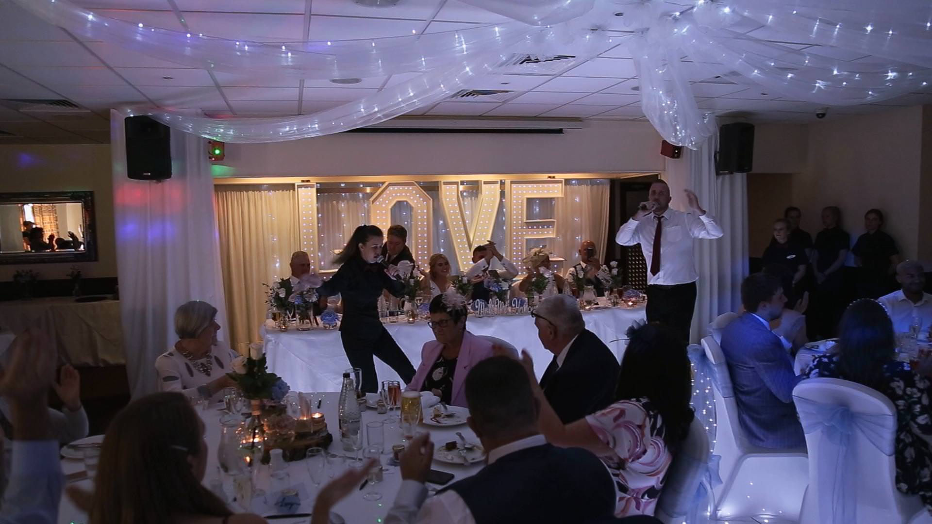 surprise shows perform at a wedding at Briars Hall in Lancashire