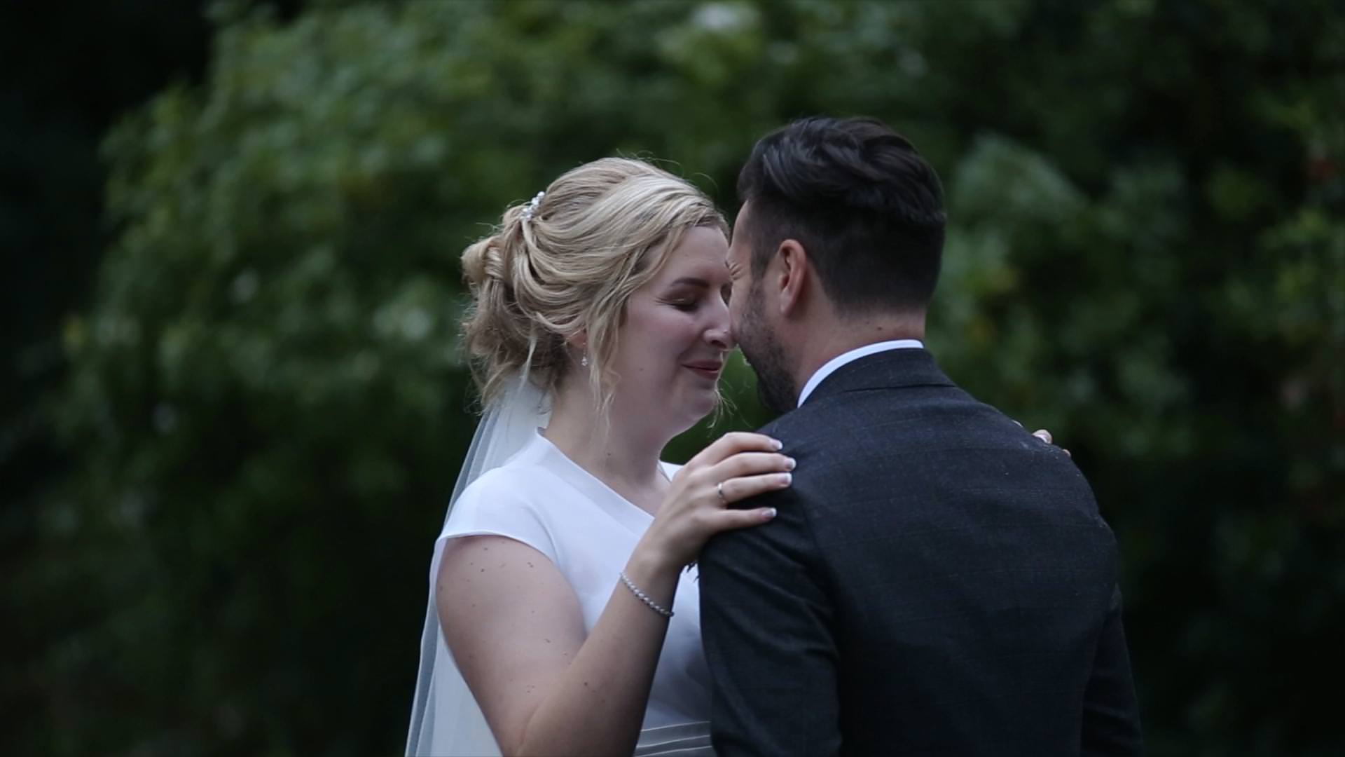 romantic moment on wedding video of bride and groom