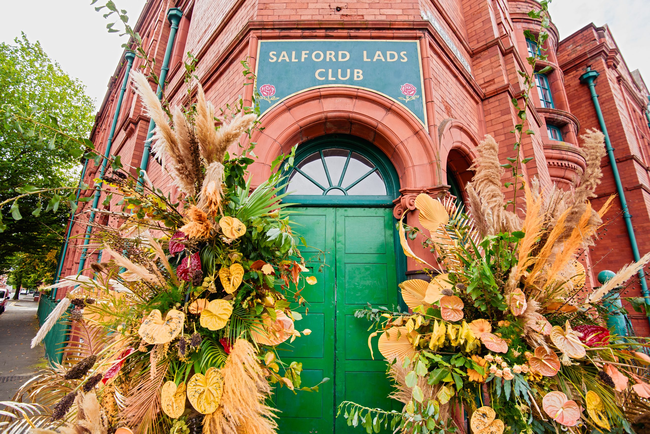 salford lads club wedding venue with floral design