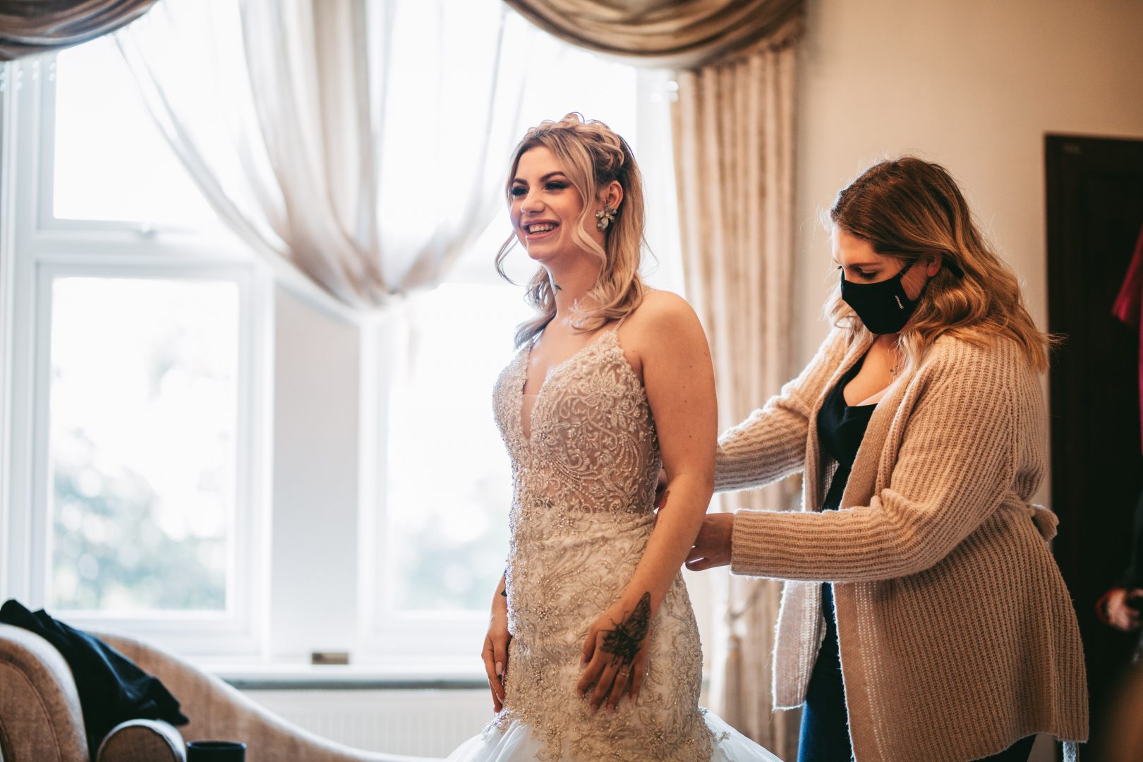 Bride getting ready in Dom Perignon Suite at West Tower Wedding Venue