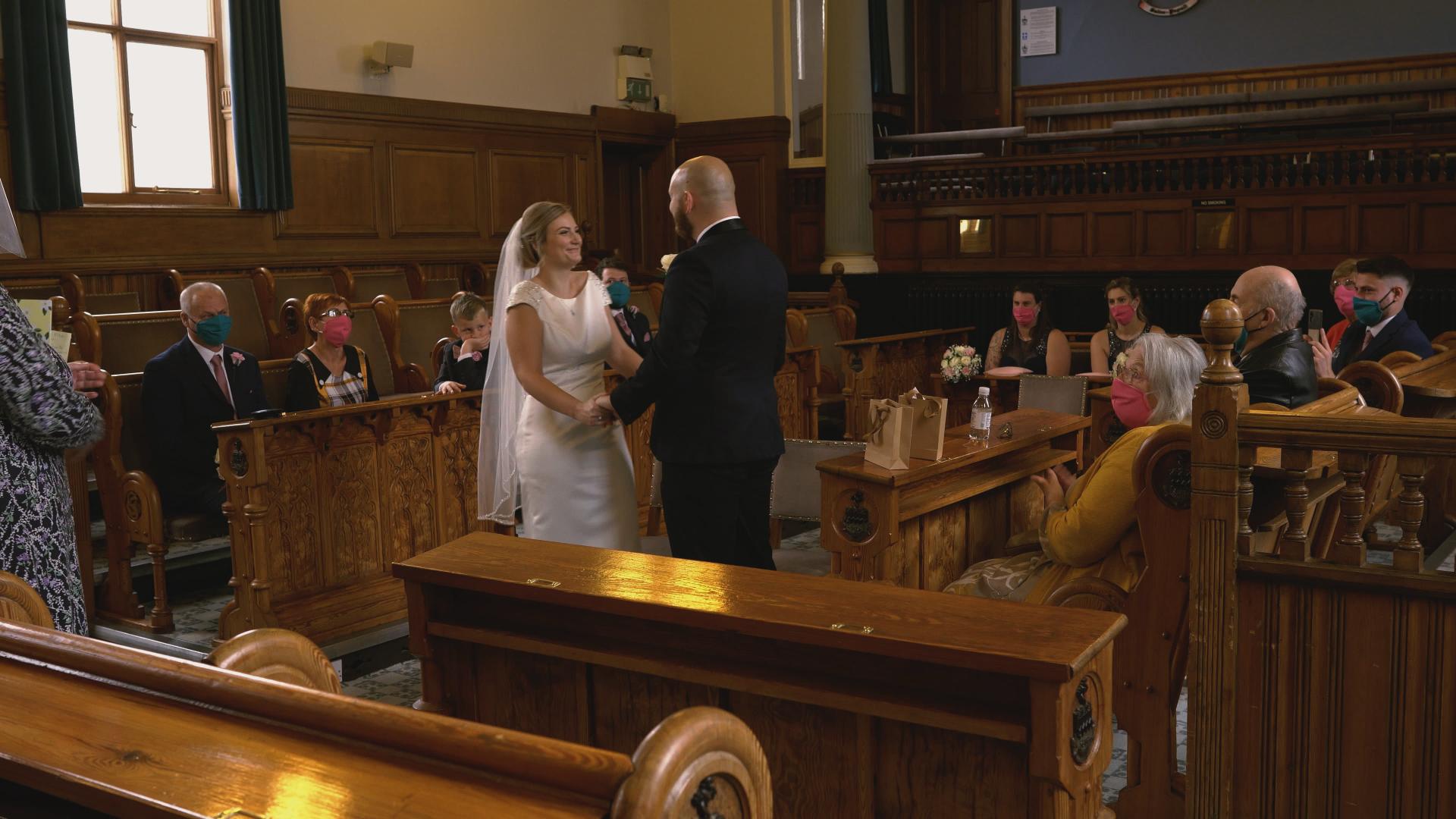 a video still of a small wedding ceremony at Southport Town Hall