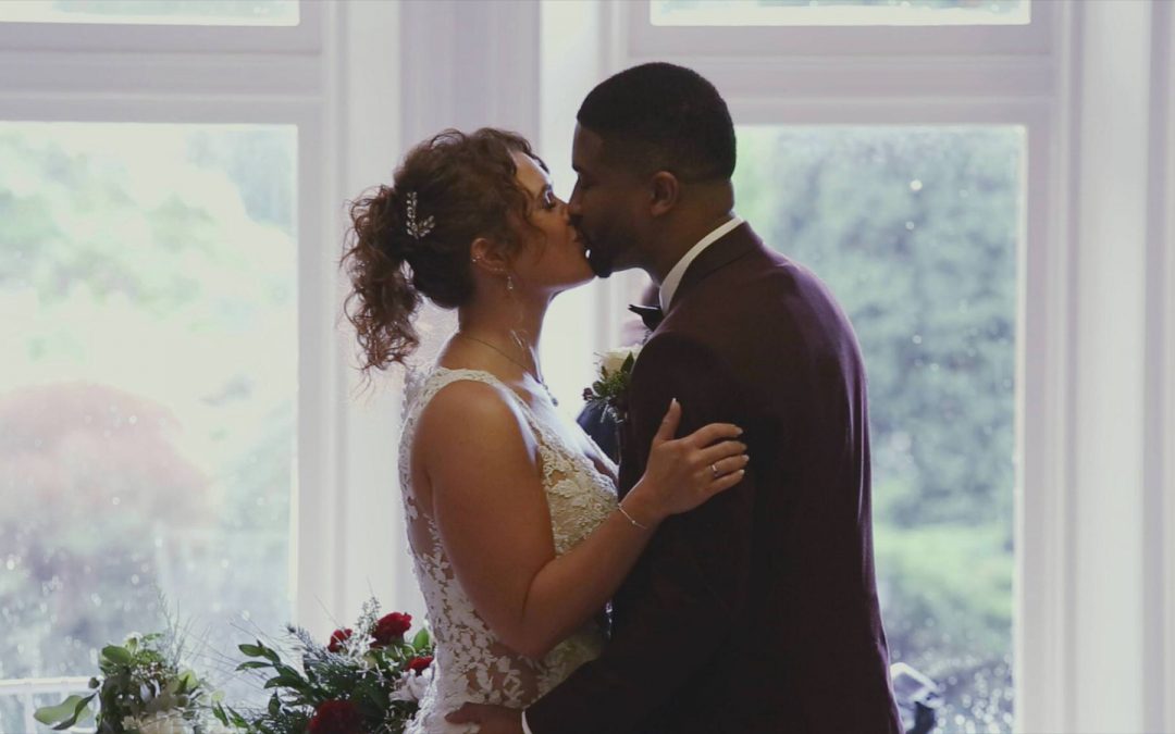 couple kiss on wedding video at Preston Micro wedding