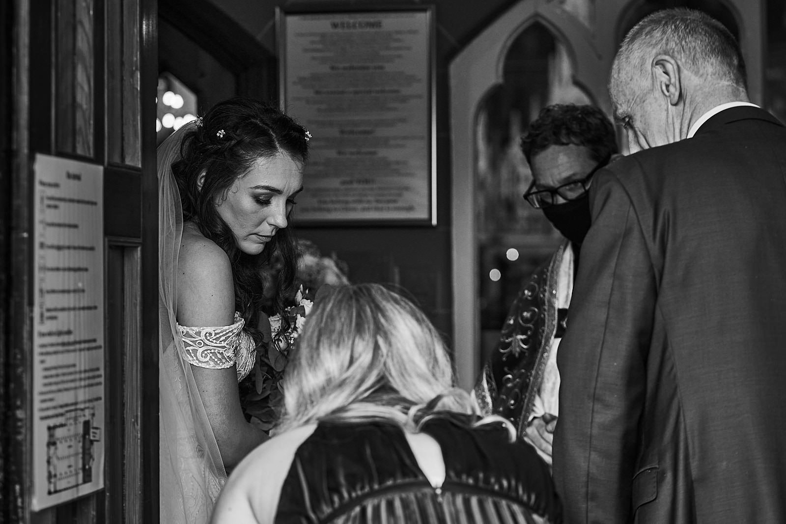 bride nervously waits to walk down the aisle in Seaforth