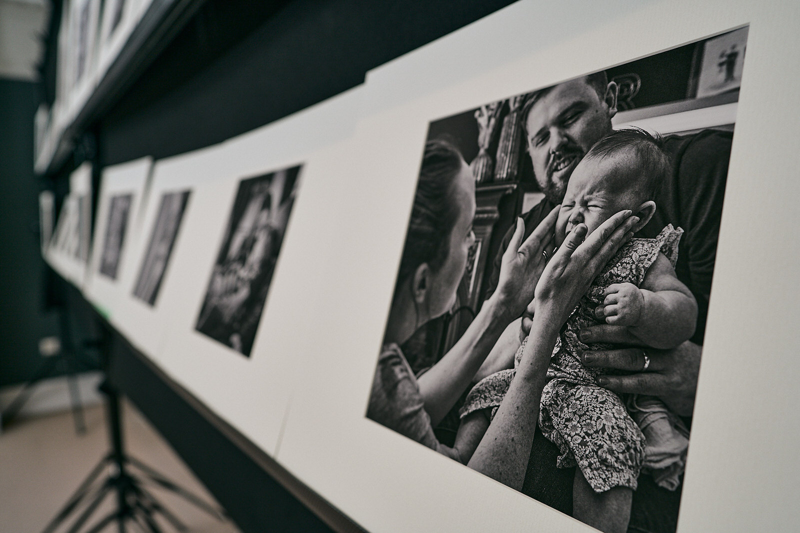 black and white family documentary photography prints ready for judging