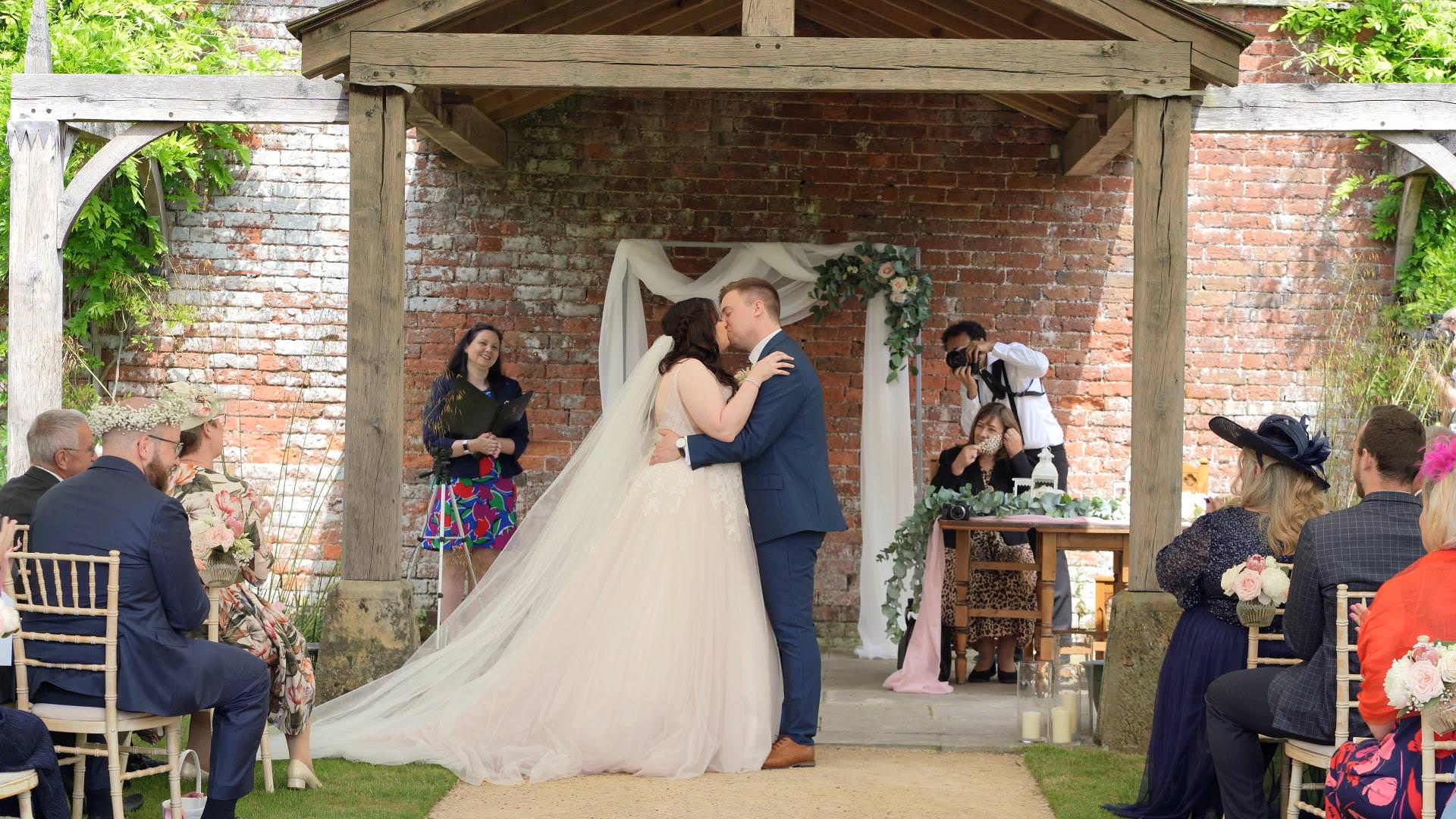 video of first kiss during ceremony at Combermere Abbey