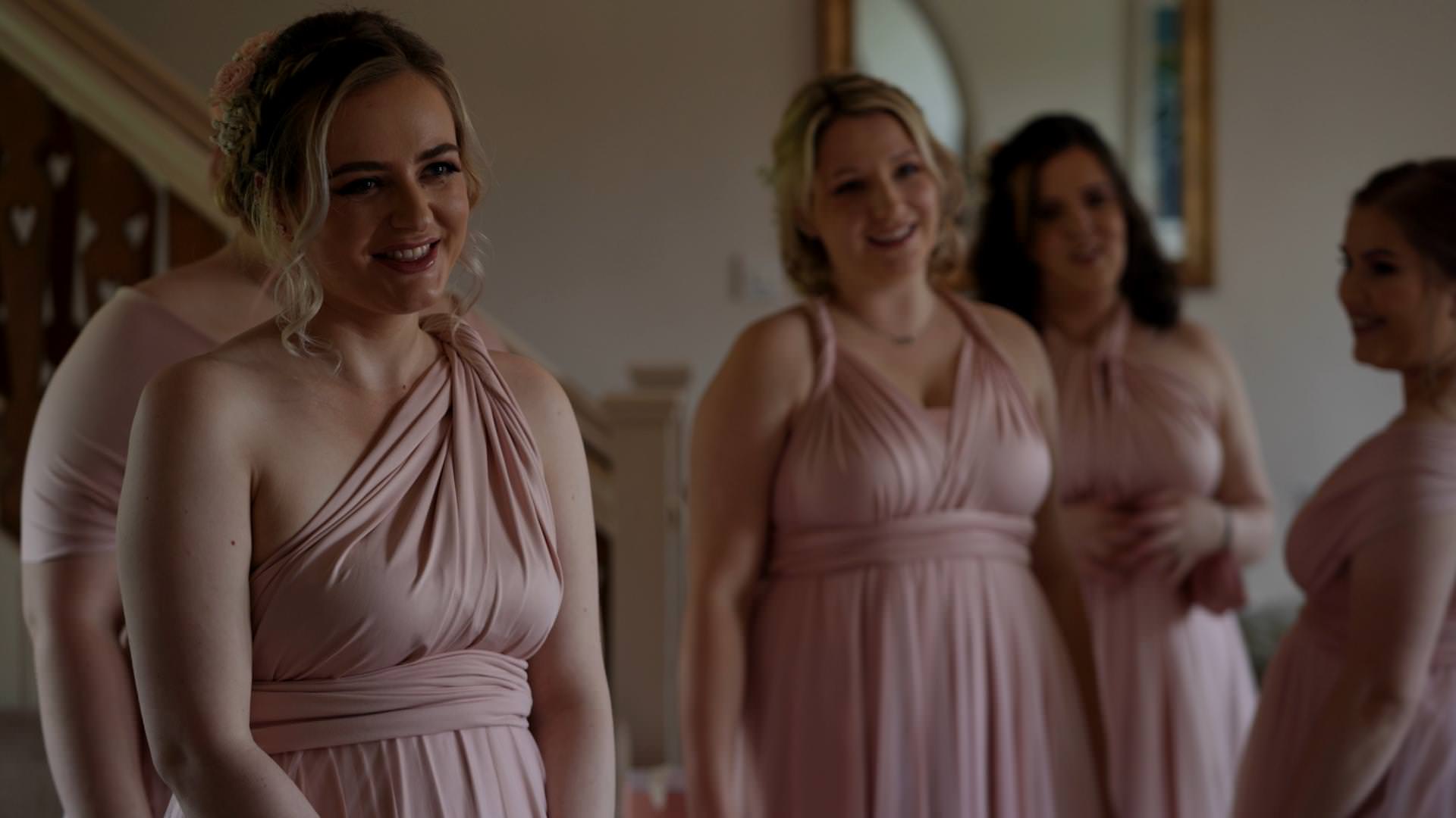 natural video moment of bridesmaids reaction to bride
