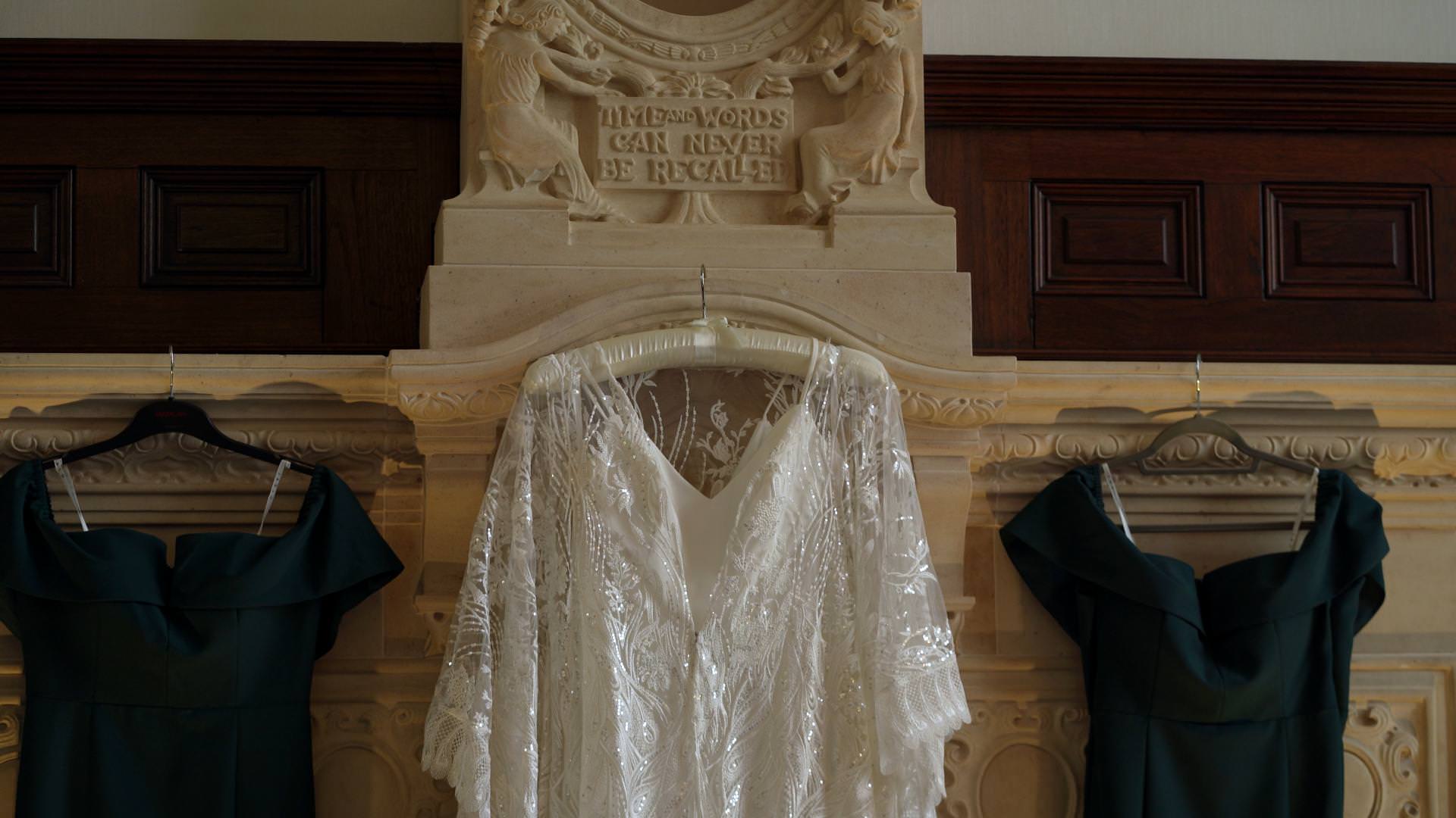 vintage inspired wedding dress hangs in Doubletree Hilton