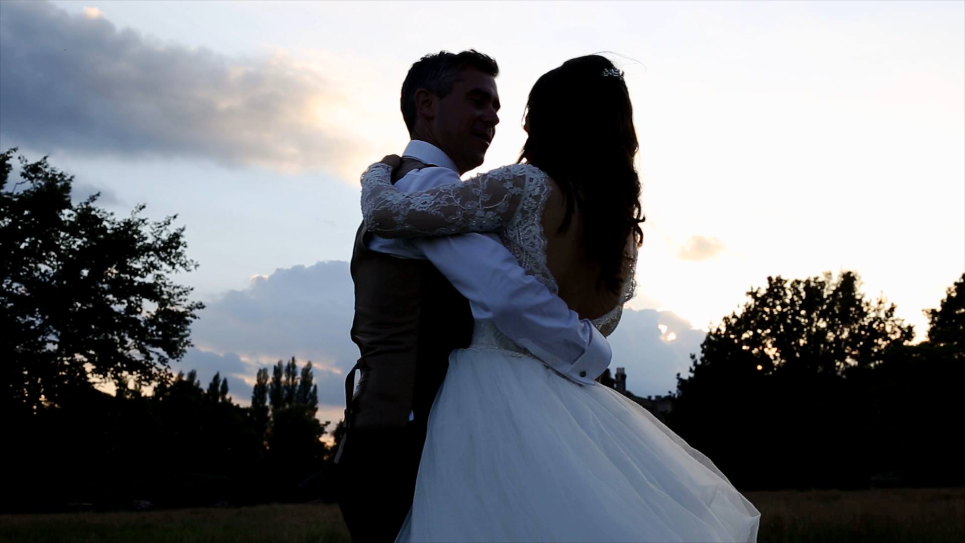 bride and groom relax during golden hour portraits