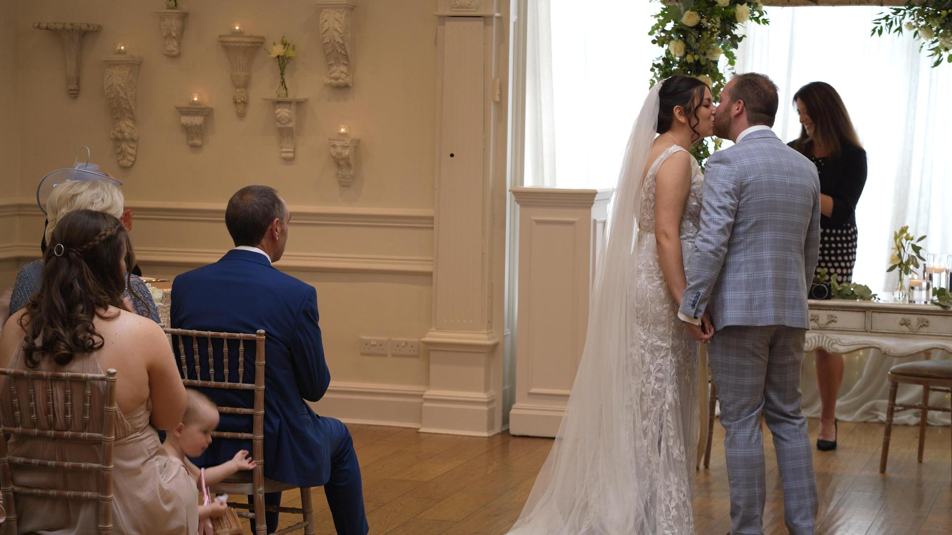 Rebecca and Nathan Ashfield House Wedding 13 couple kiss during ceremony at ashfield house