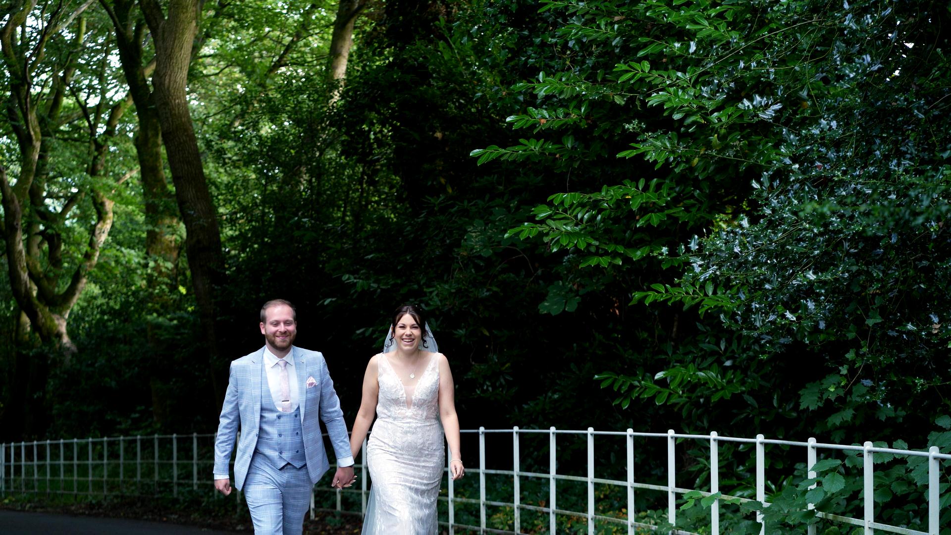 Rebecca and Nathan Ashfield House Wedding 18 couple walk down drive at Ashfield House