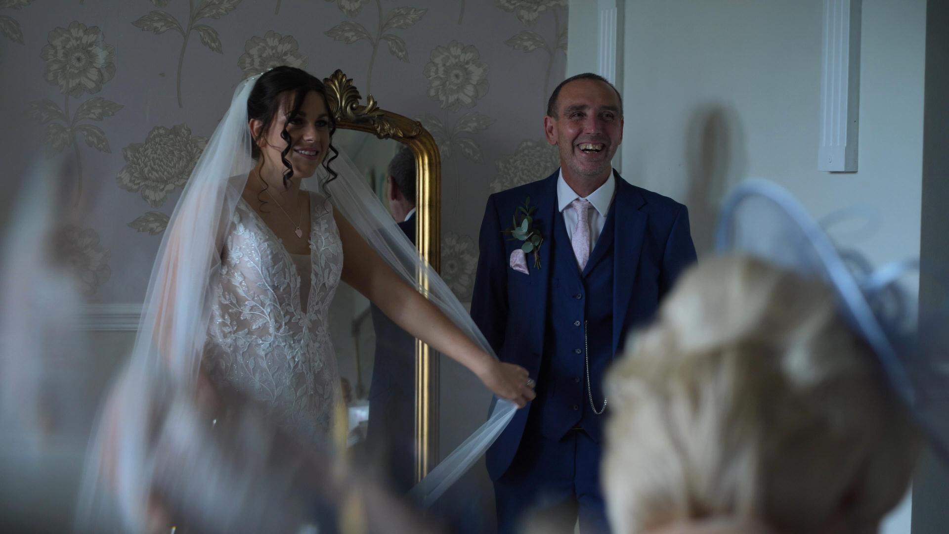 Rebecca and Nathan Ashfield House Wedding 9 bride waits with her dad at Ashfield House wigan