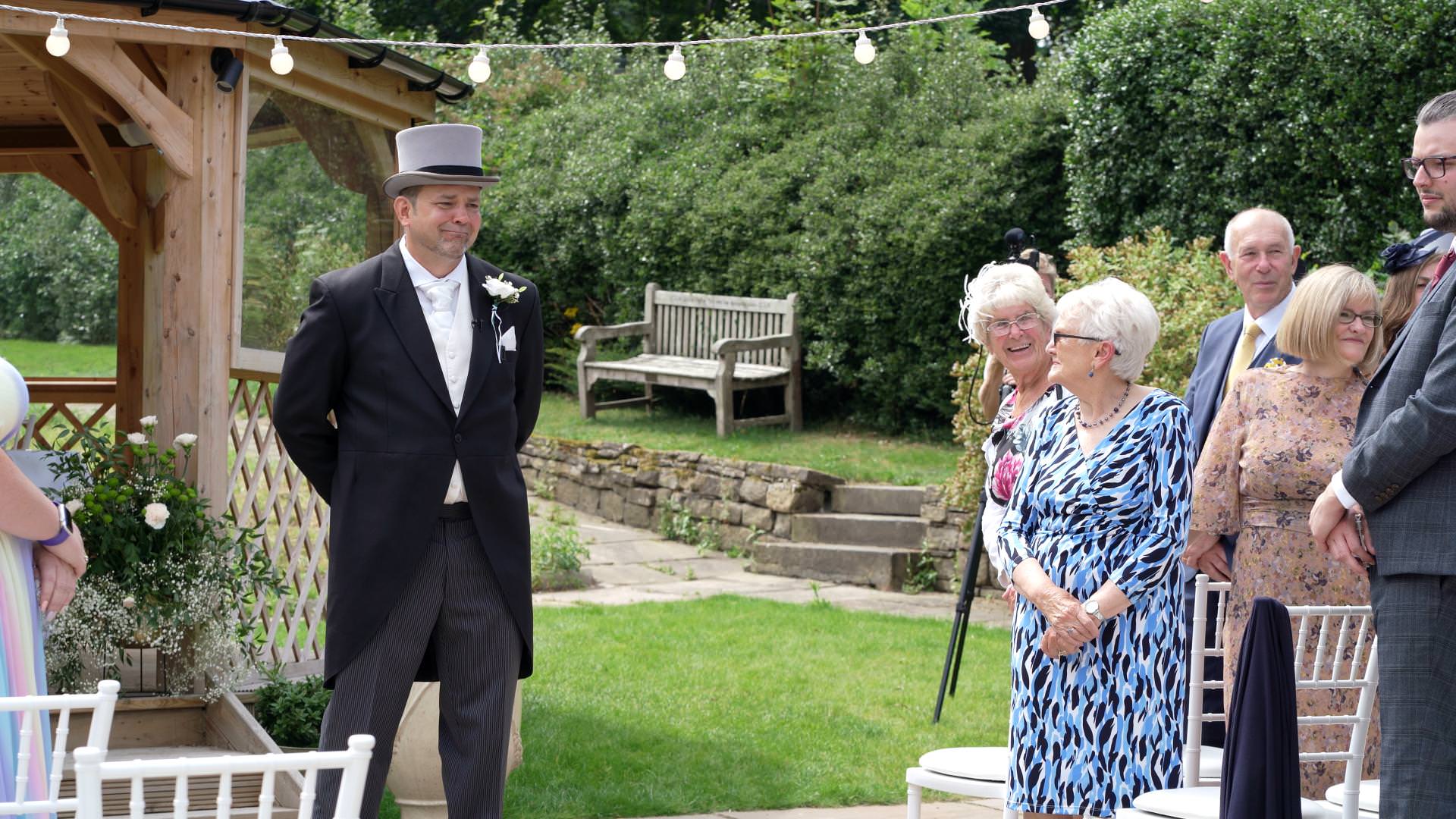 groom crying during wedding ceremony at Whitley Hall