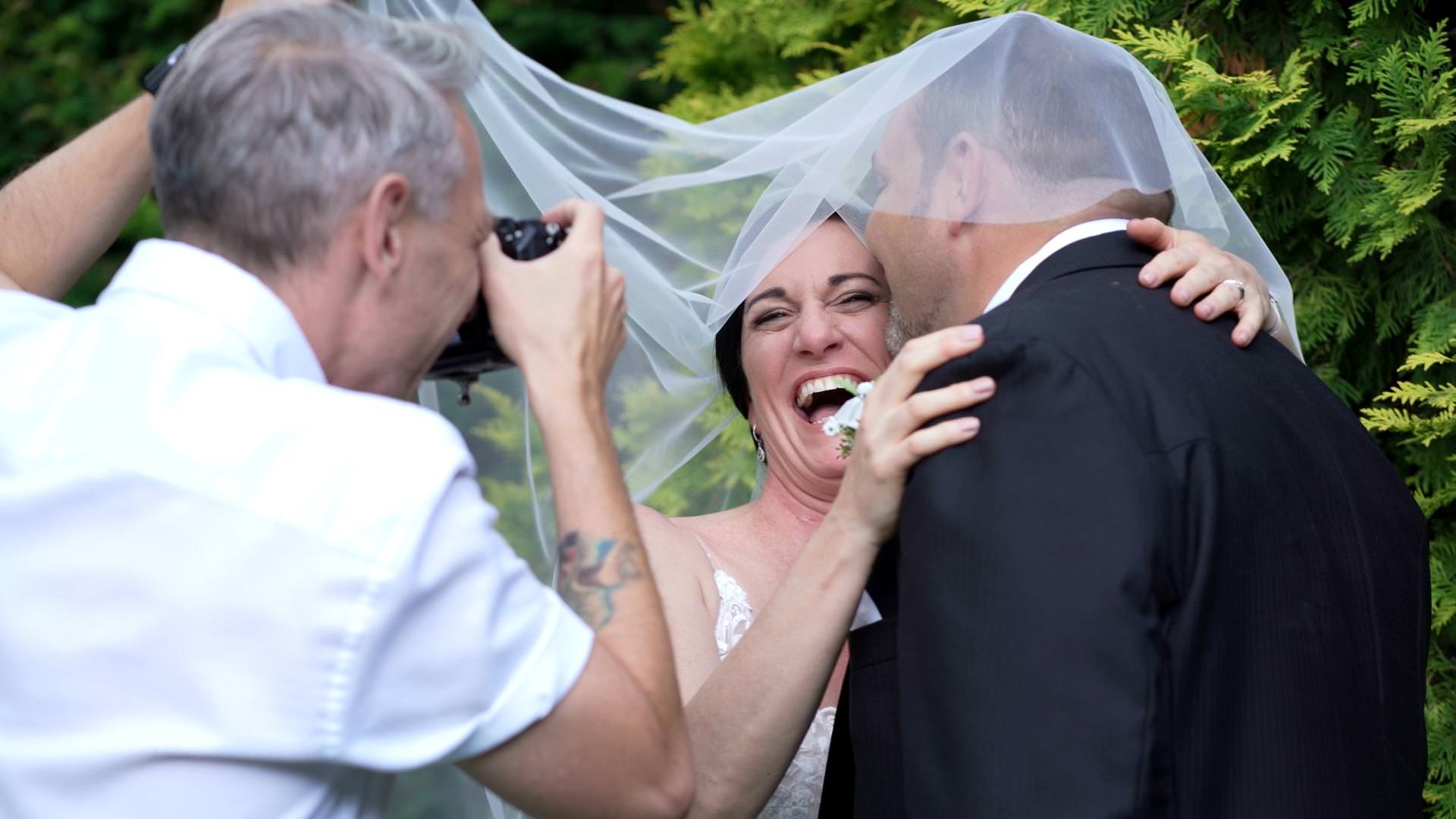 couple laugh with Phil Sailsbury photography