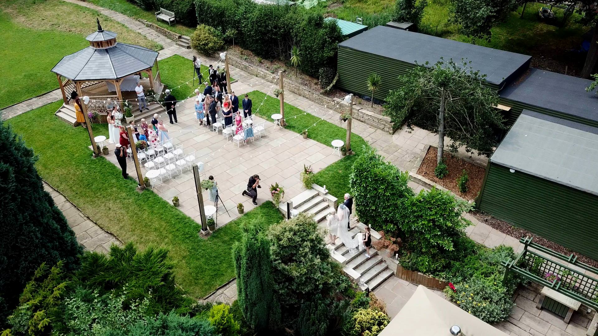 drone shot of outdoor ceremony at Whitley Hall
