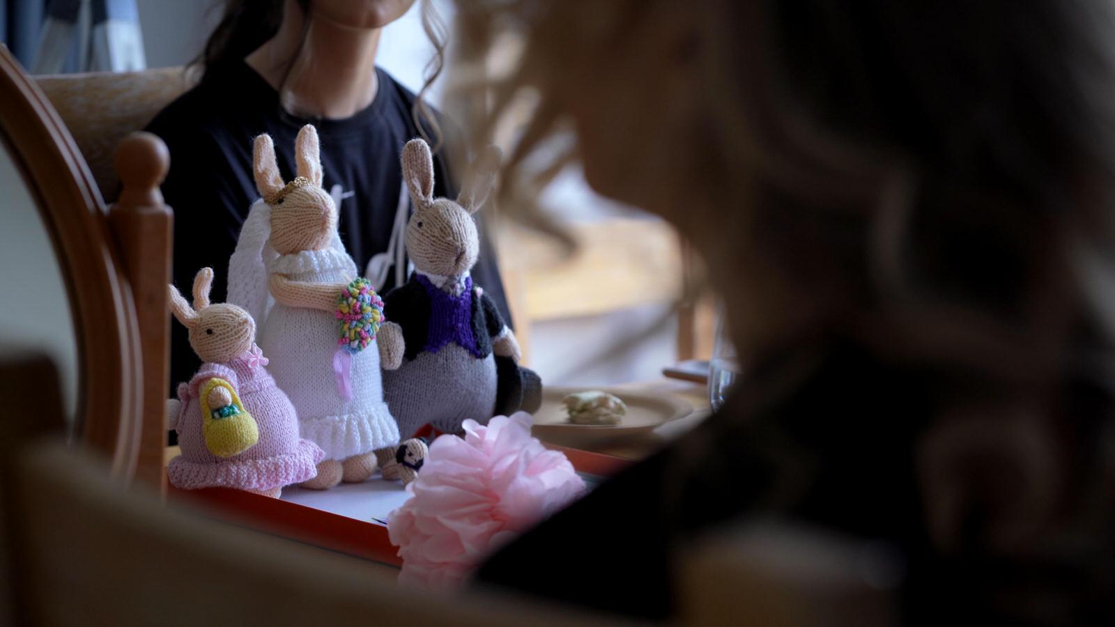 knitted bride and groom rabbits on table