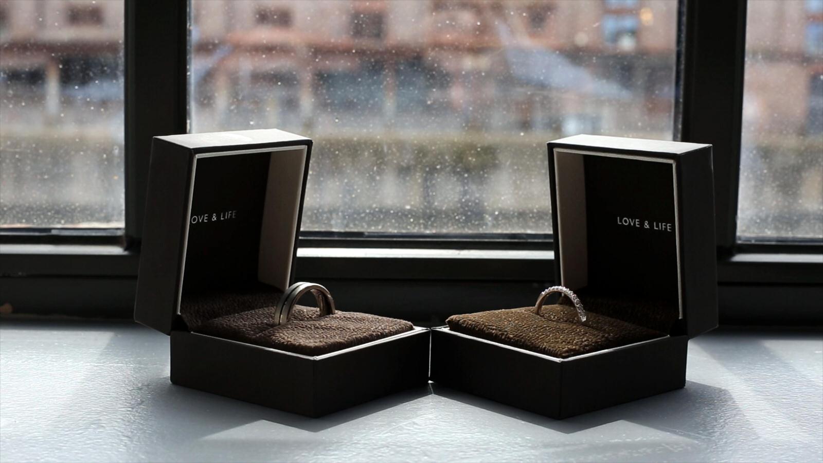 wedding rings sit in window of titanic hotel liverpool