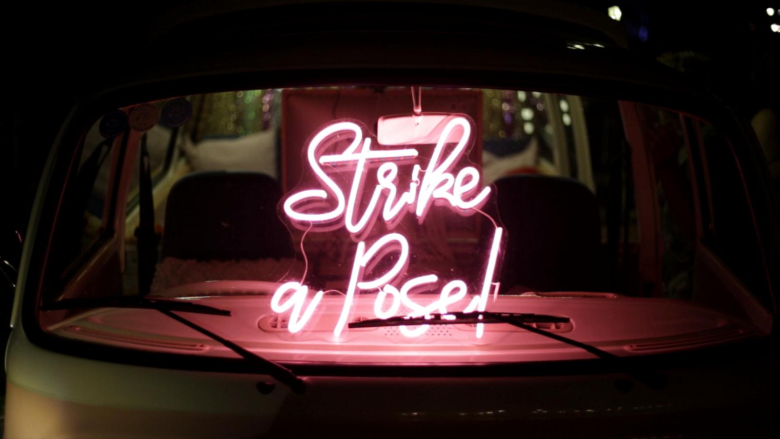 strike a pose neon inside Birdie campervan