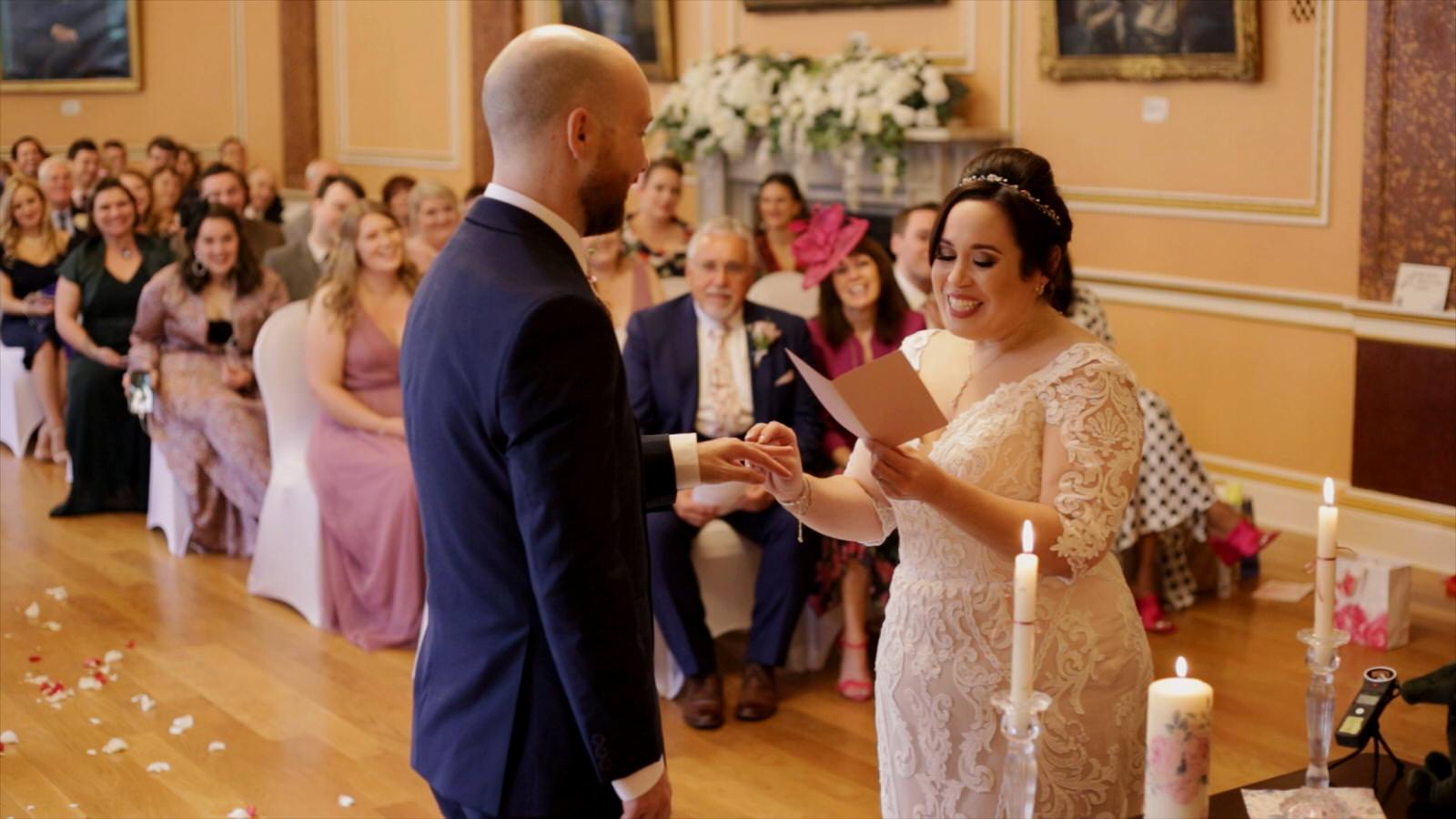 bride reads personal vows during liverpool wedding