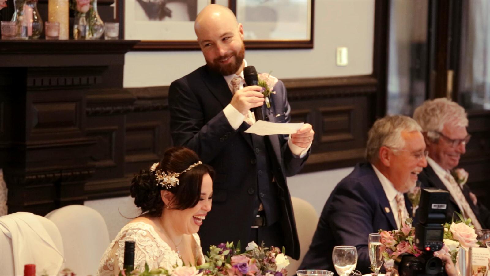 groom makes everyone laugh during speeches