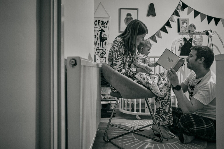 natural photo of family reading bedtime stories