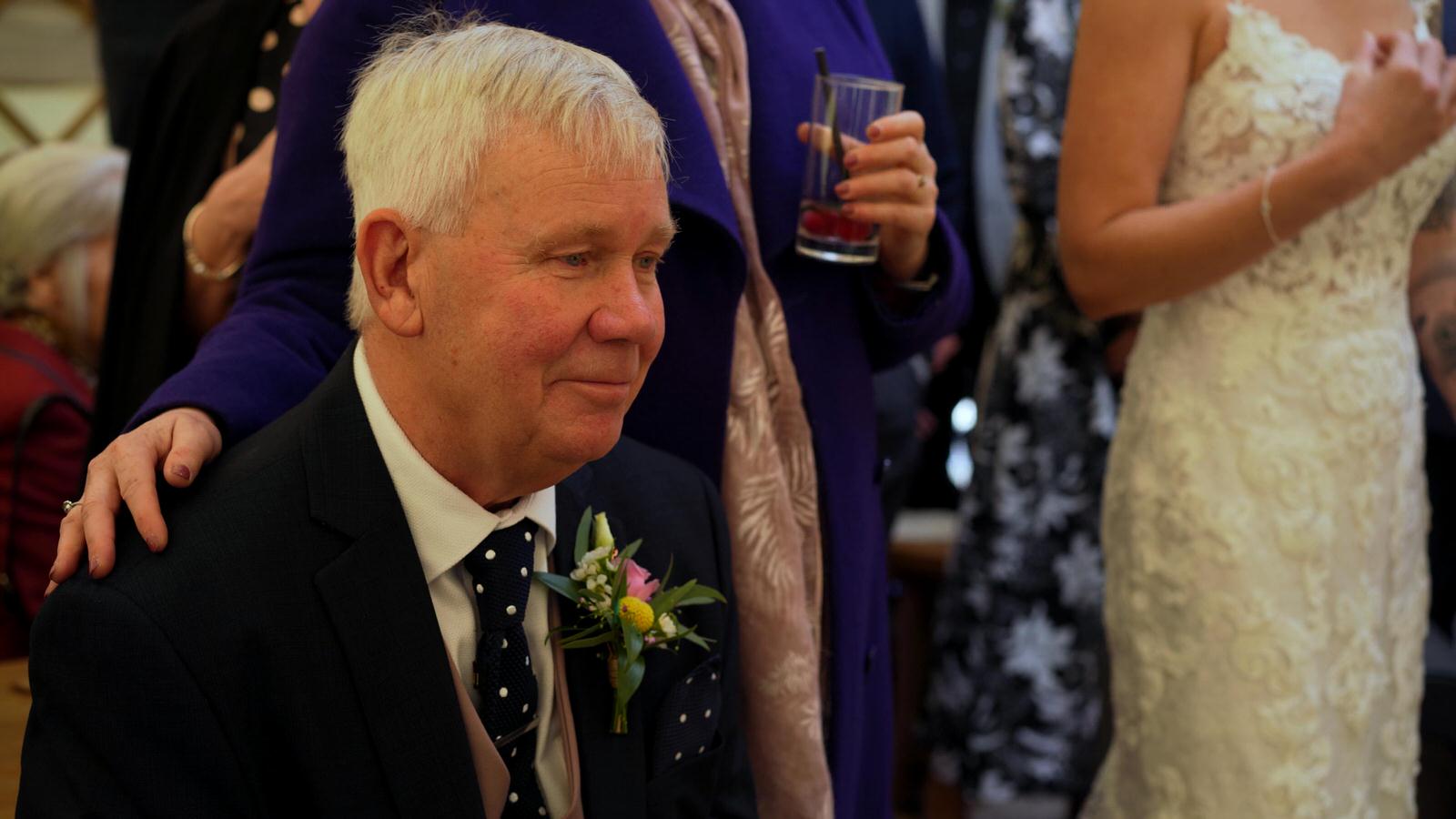 father of the bride gets emotional during speeches