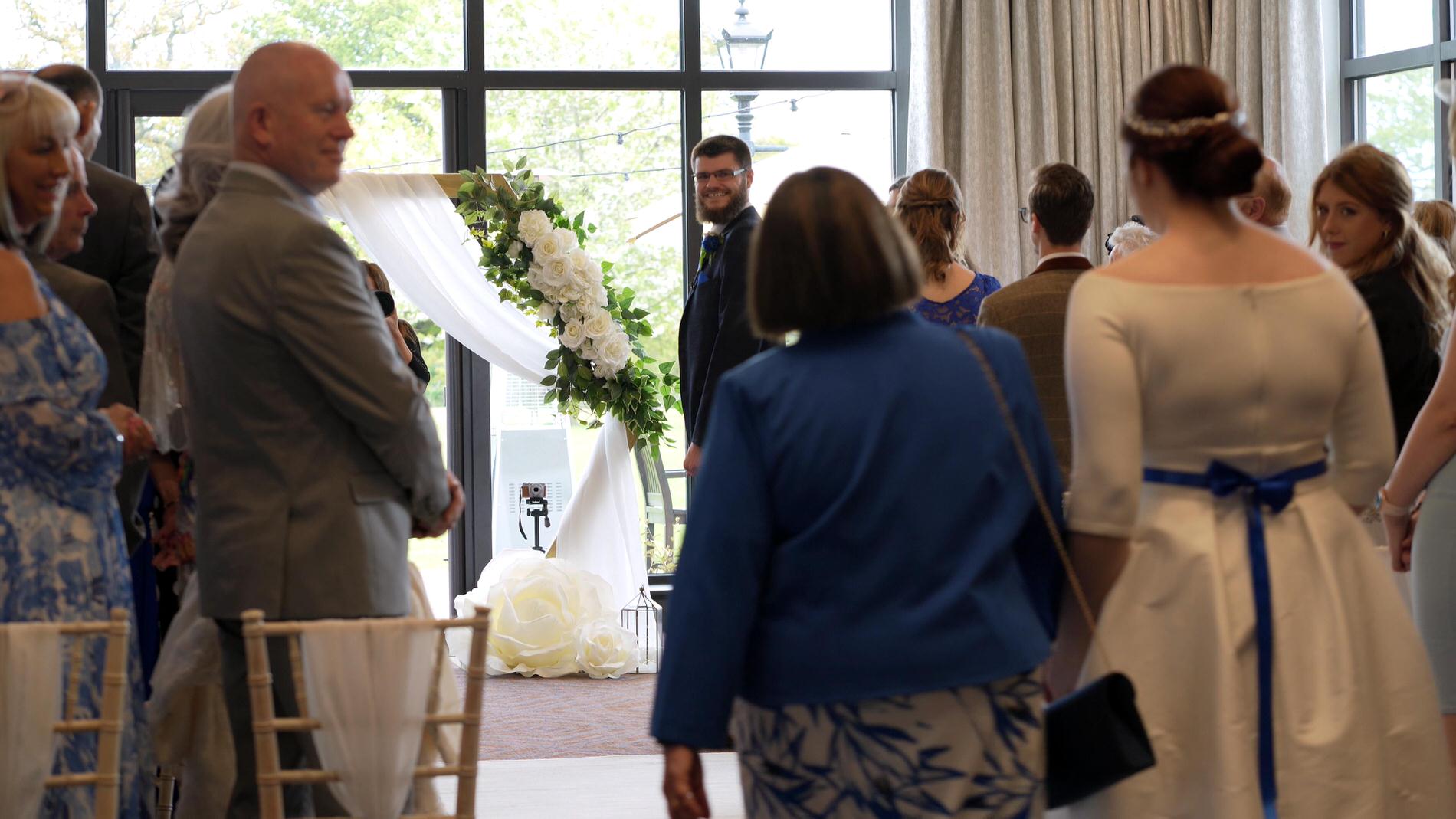 bride walks down the aisle at Rookery Hall