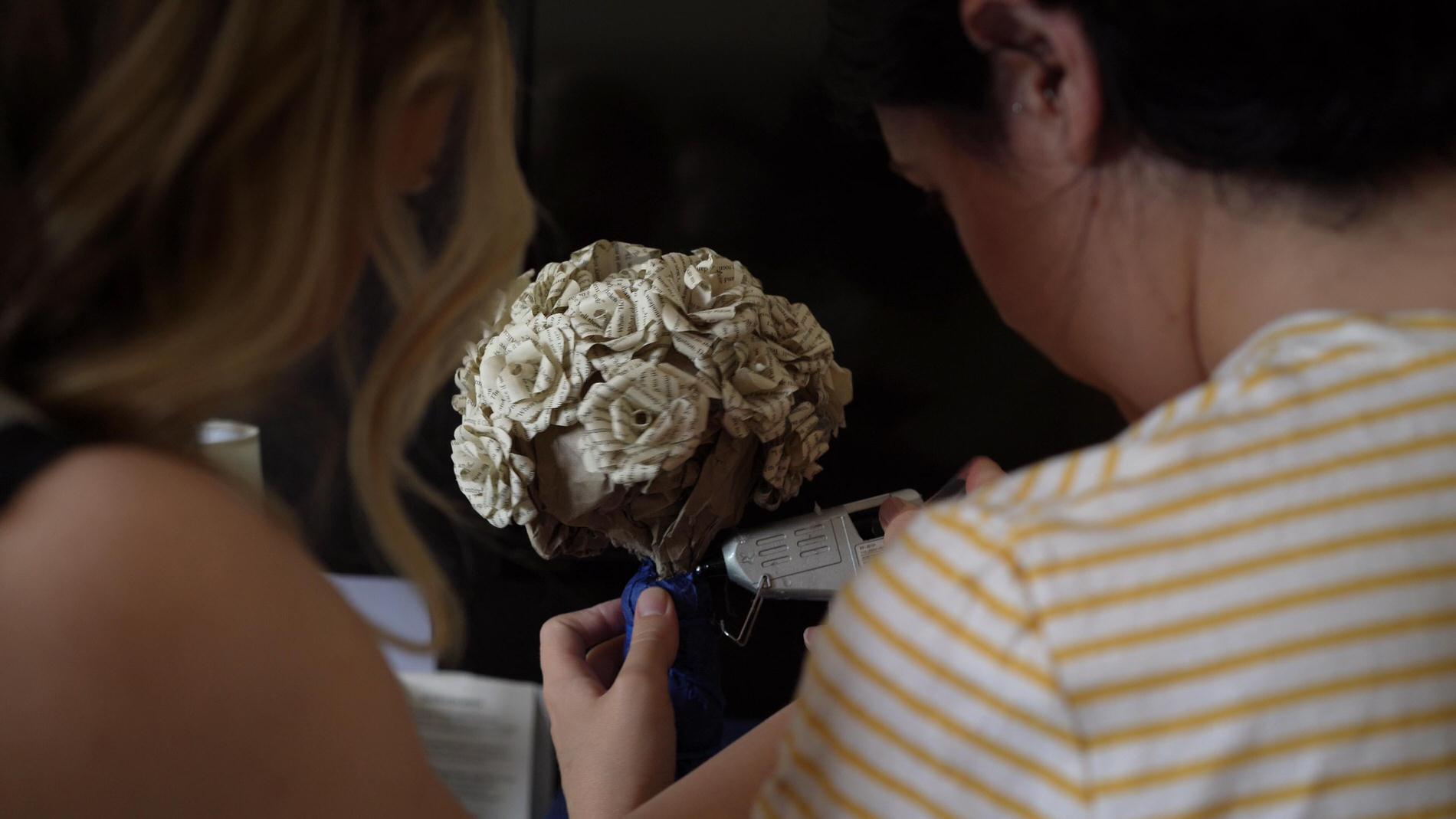 bridesmaids glue paper flower bouquet together