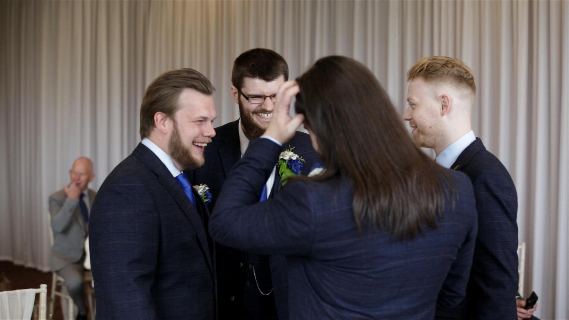 groom laughs with Best Men before ceremony at Rookery Hall