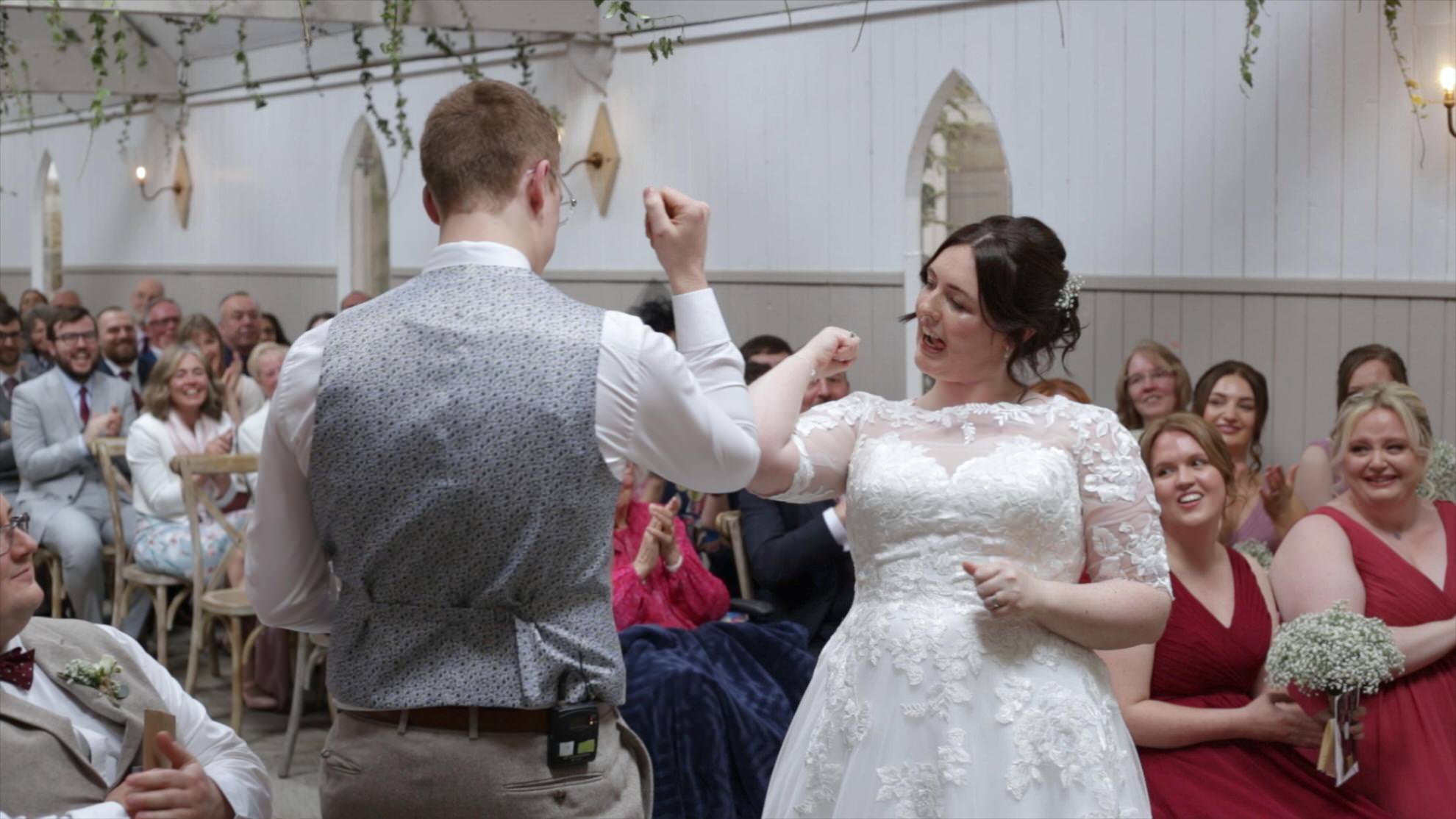 fun handshake during personal wedding at Wyresdale Park