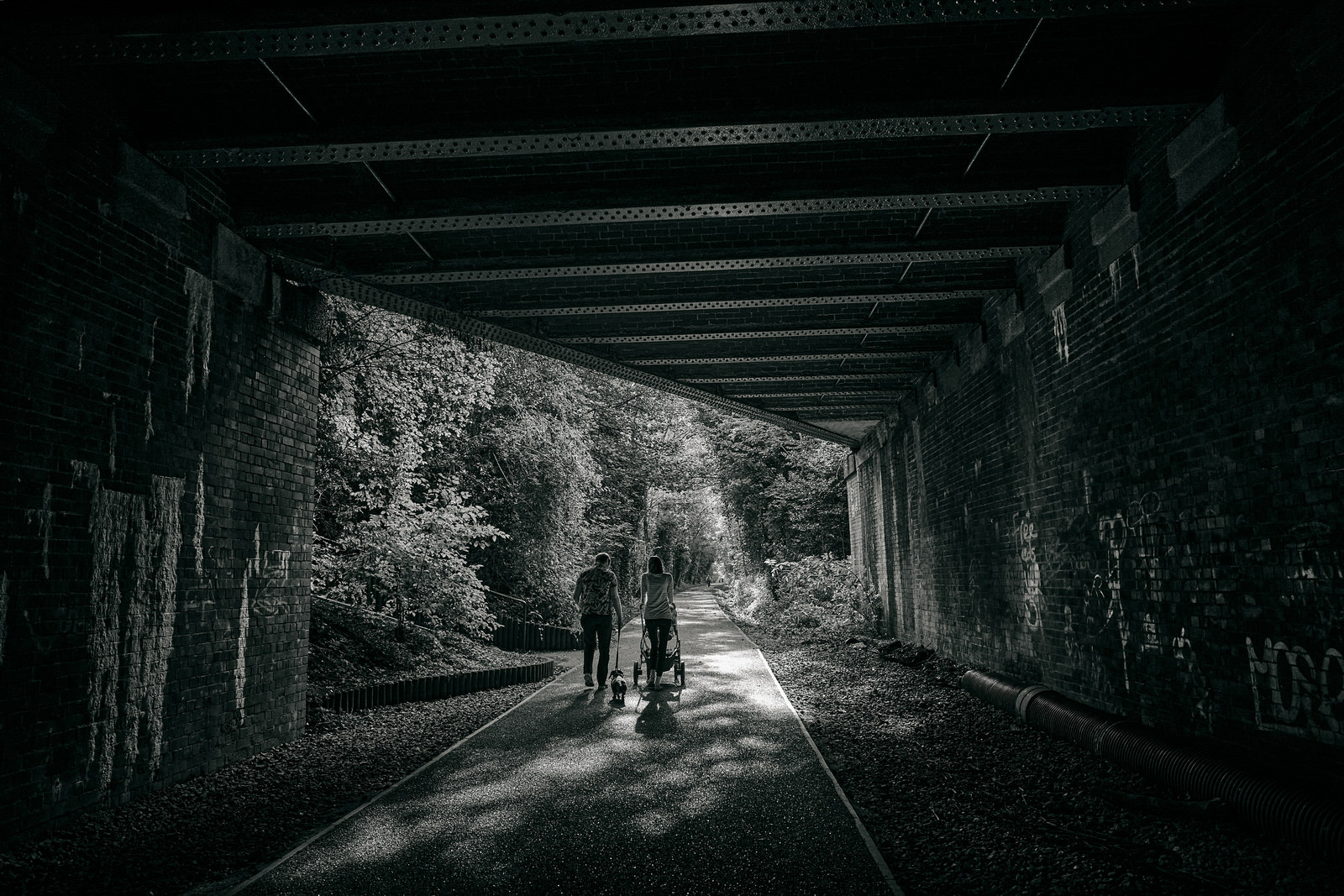 natural photo of family walking the loop line in Worsley