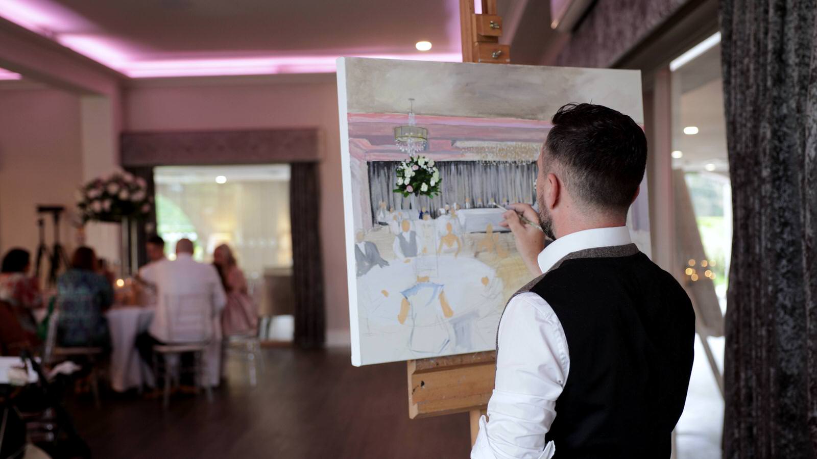 live oil painting during wedding reception