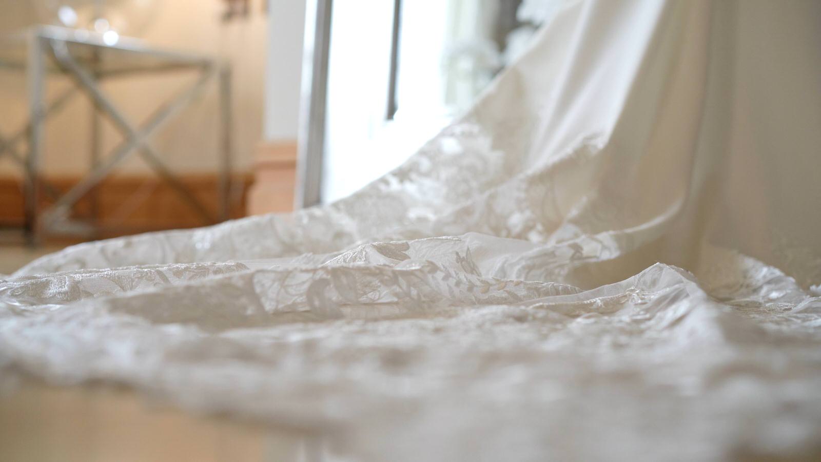 close up video still of lace wedding dress at Merrydale
