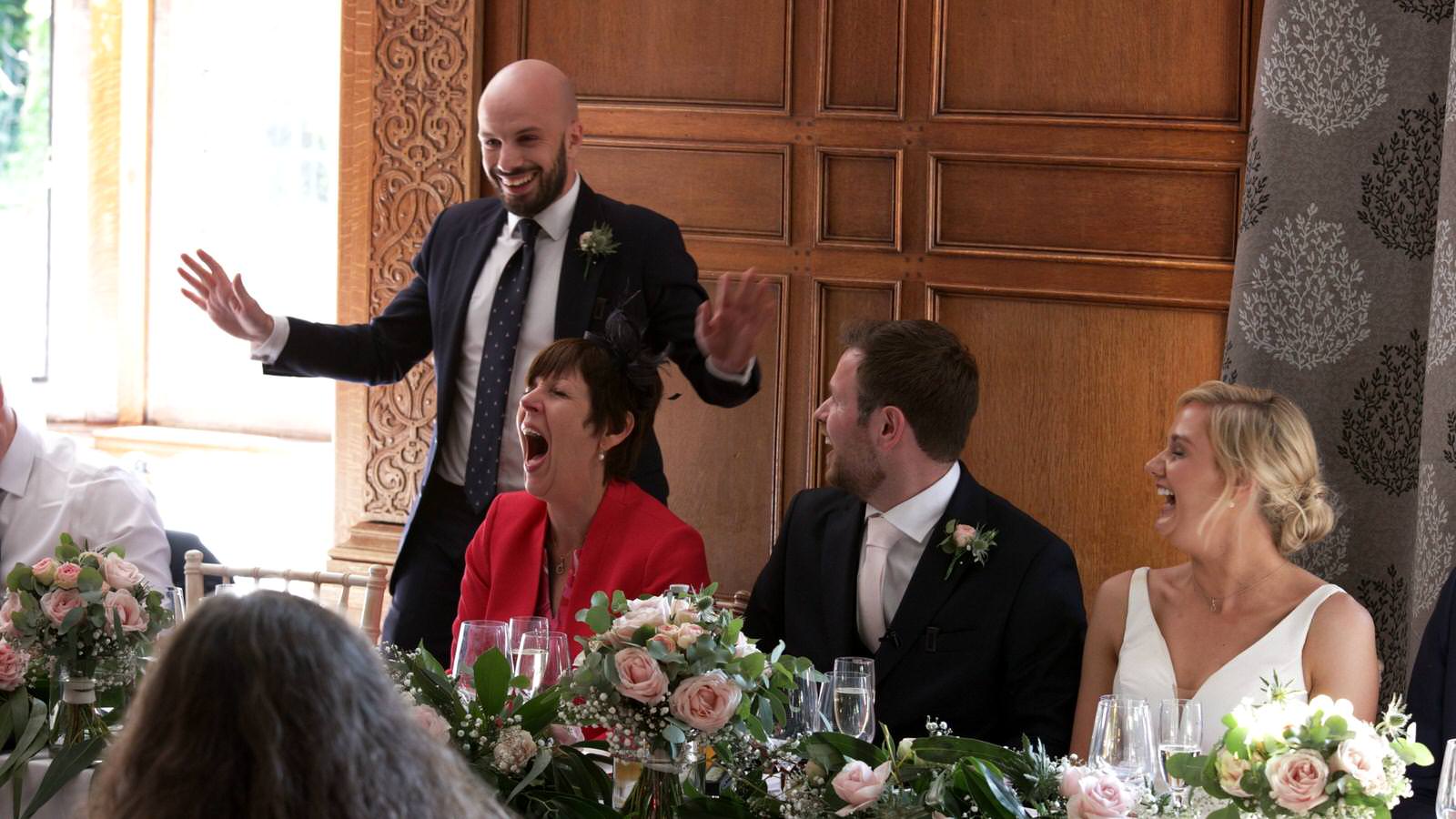 best man makes top table laugh during speeches