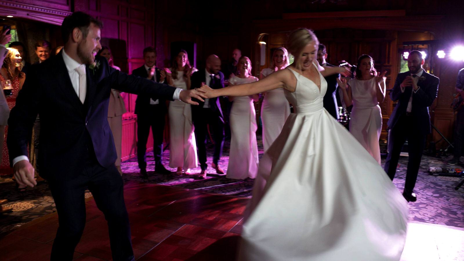 bride and groom enjoy a spin on the dancefloor at Inglewood