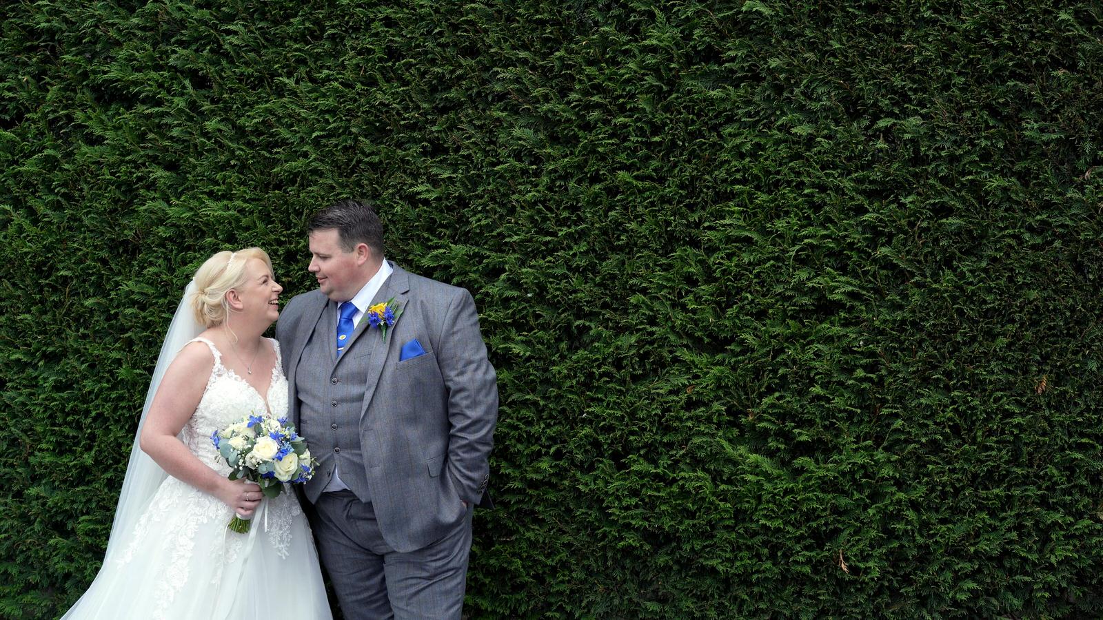 couple laugh during wedding in lancashire
