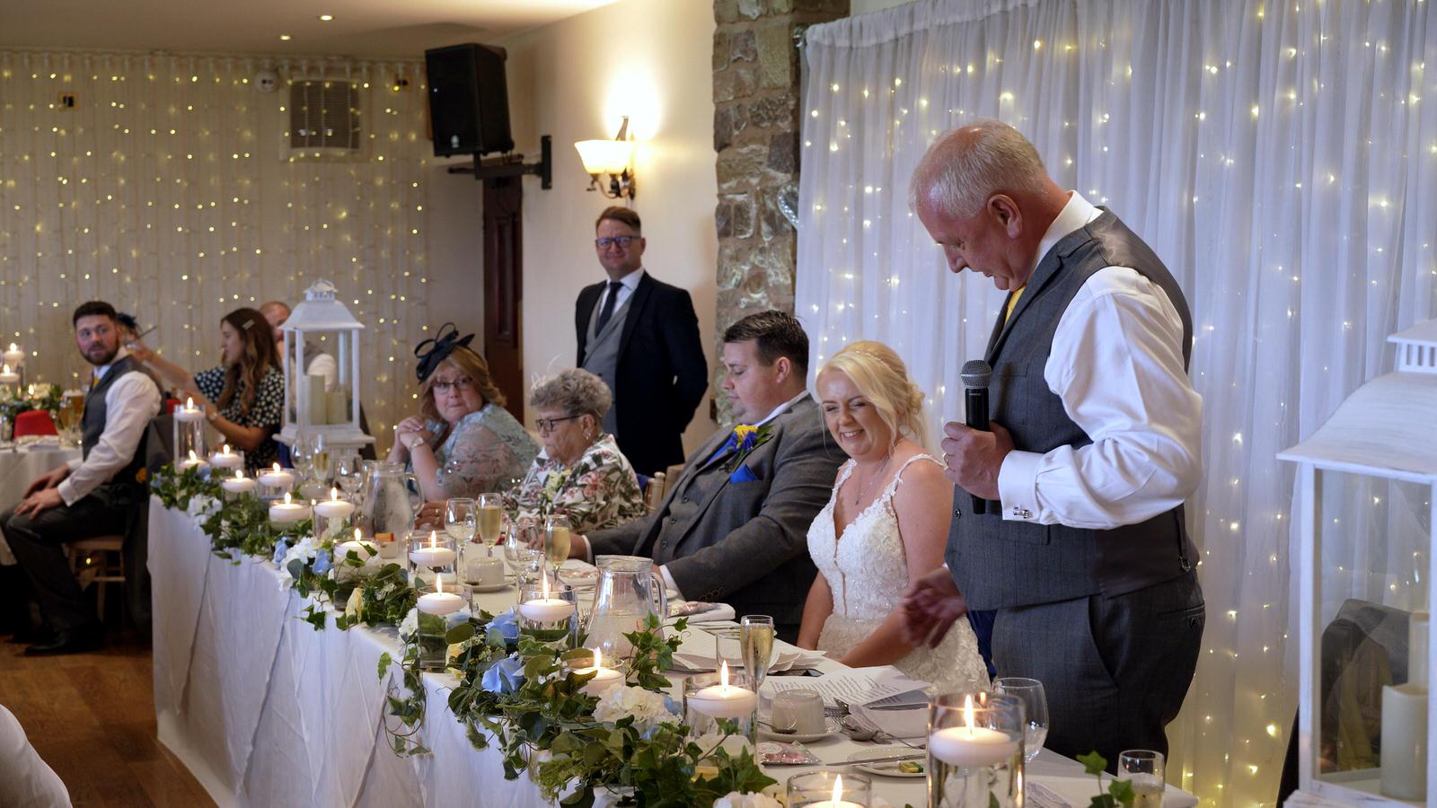 bride cries during her dads speech at Beeston Manor