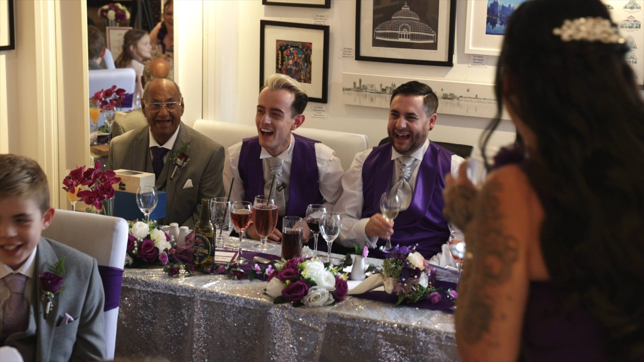 top table laughs during wedding speeches