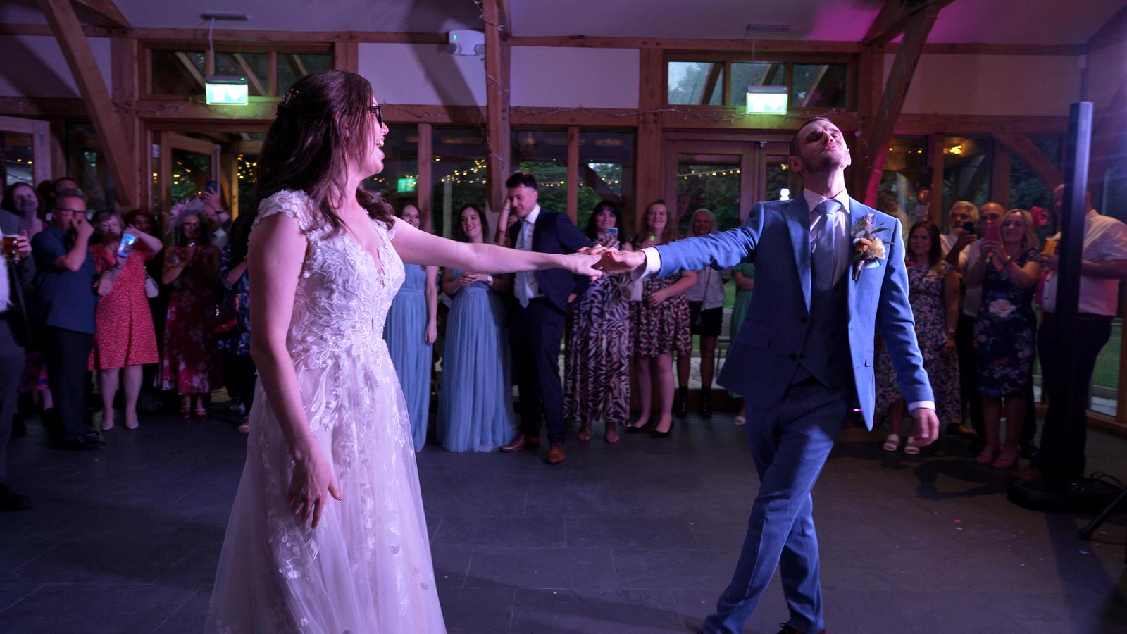 Kerry and Nicks Oaktree Peover wedding 33 couple have fun during their upbeat wedding dance