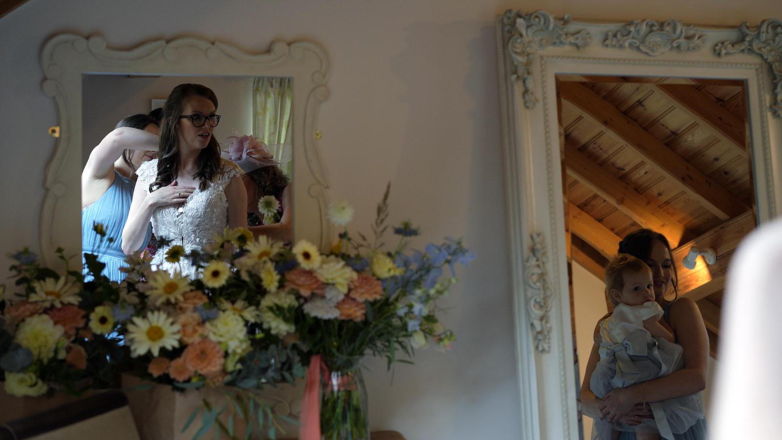 Kerry and Nicks Oaktree Peover wedding 8 brides reflection in bridal dressing room at oaktree of peover