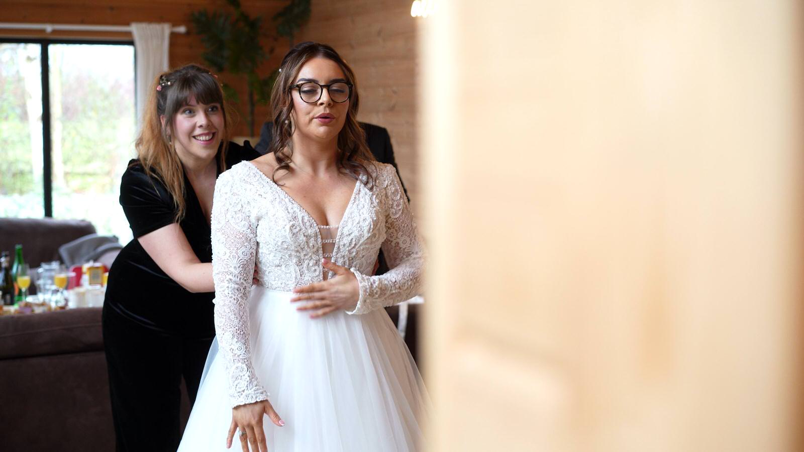 nervous bride takes deep breath getting ready