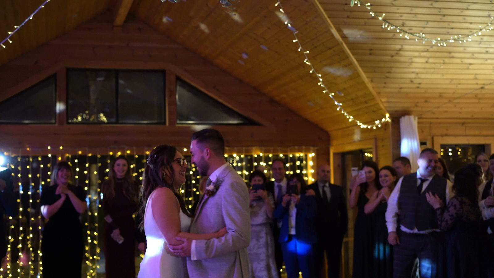 couple dance under disco ball at Styal Lodge