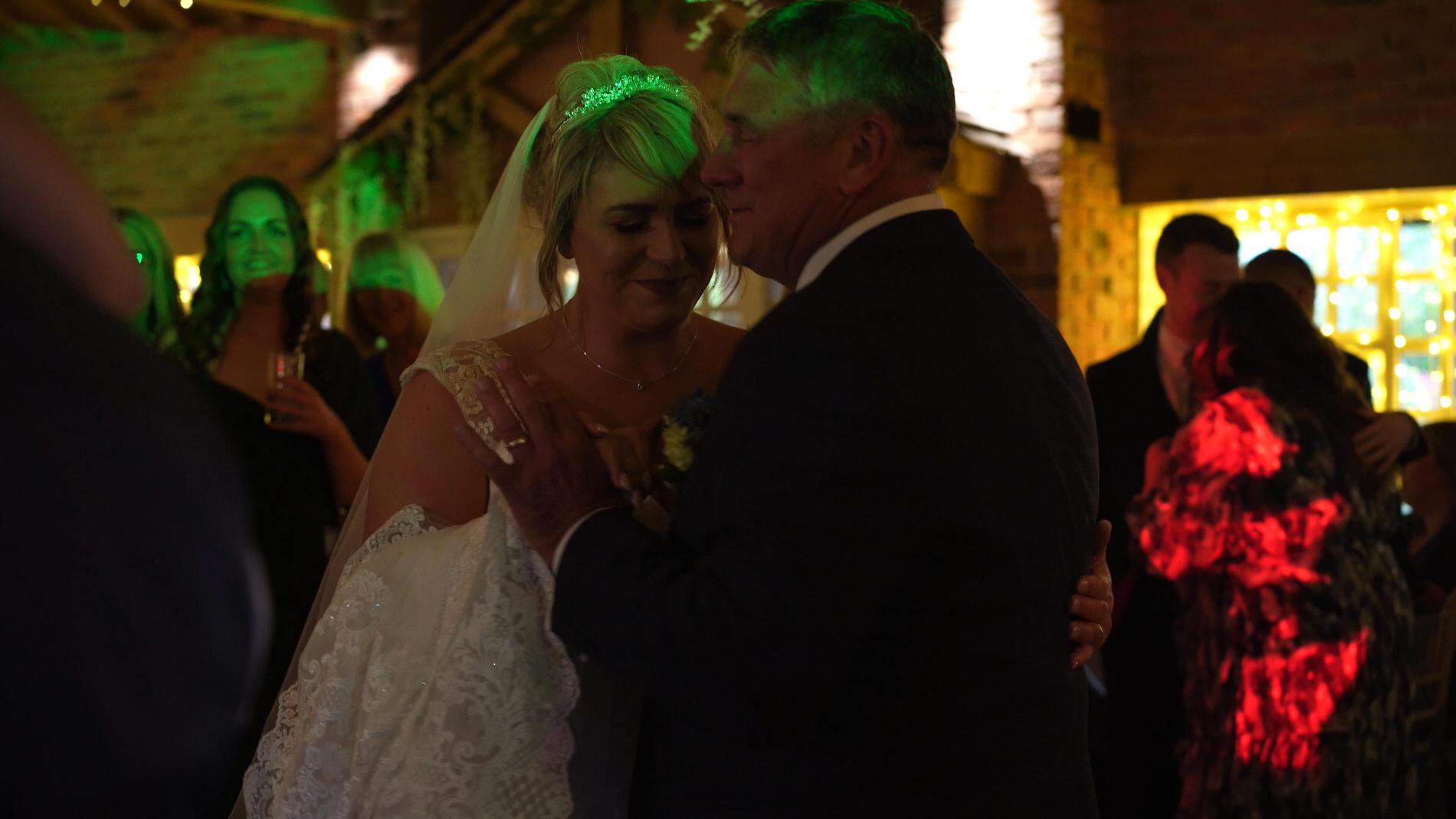 father and daugther dance at Charnock Farm