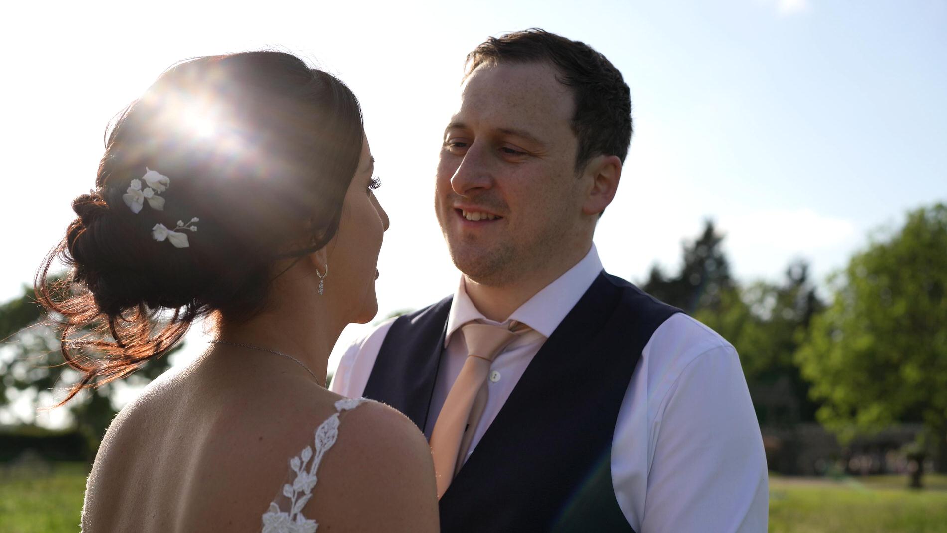 Courtney Dan Wharfdale Grange Wedding Video 32 video still of couple posing in the golden hour
