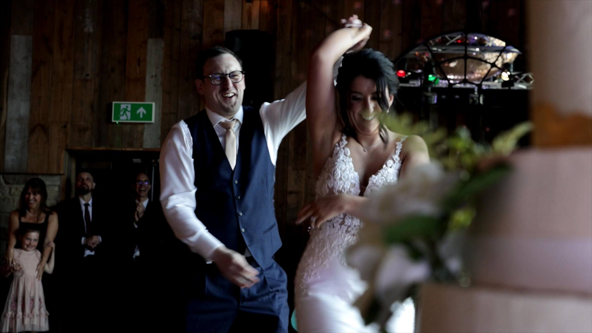 the couple enjoy an upbeat first dance