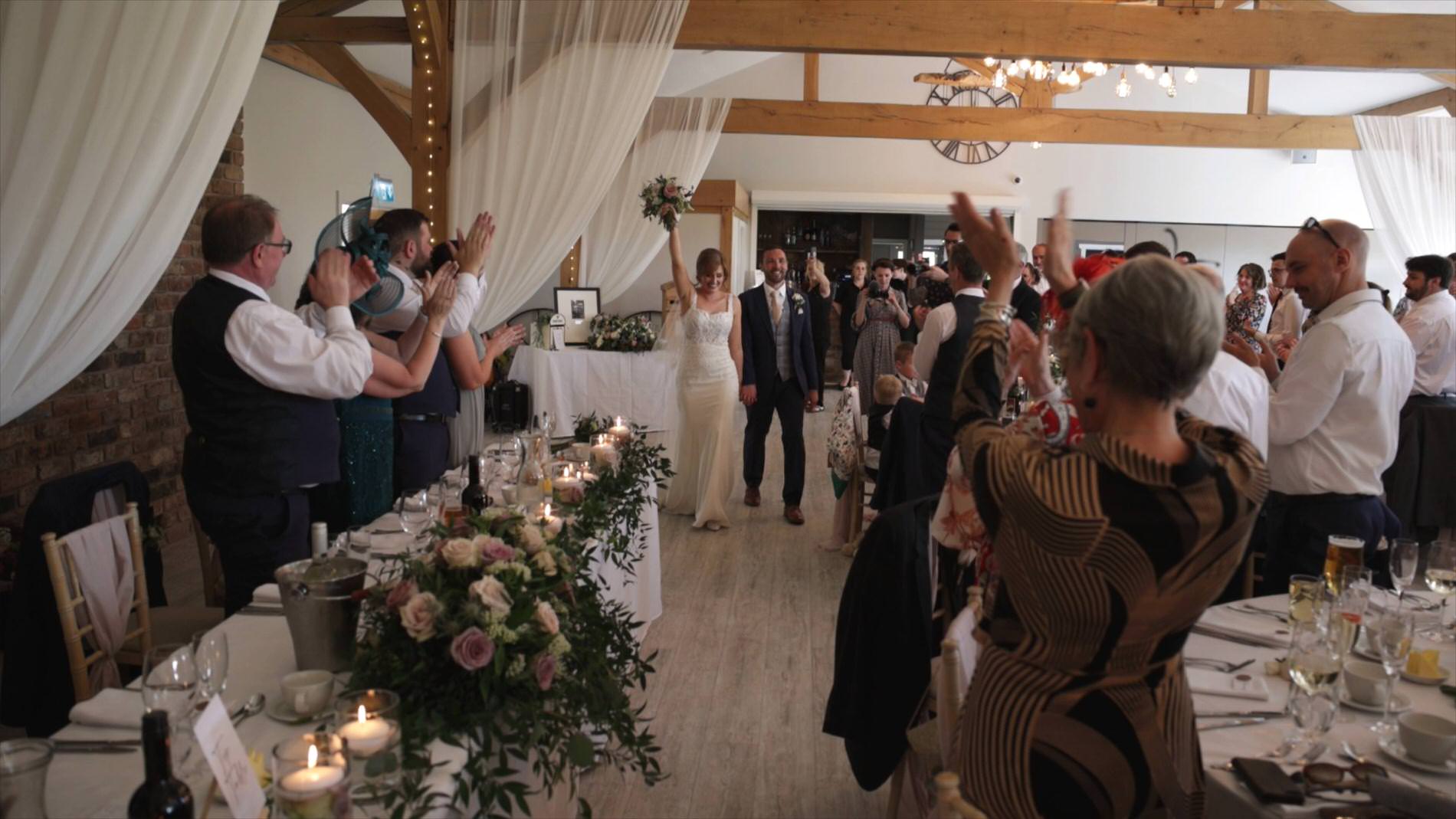 Hannah and Alexs Pryors Haye Wedding Video 31 guests cheer as the couple enter the reception room at Pryors Hayes Golf Club